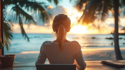 young businesswoman dressed formally at work daydreaming of vacations and relaxation with a beautiful tropical beach scene featuring palm trees
