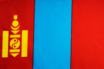 National flag of the state of Mongolia close-up. State background.
