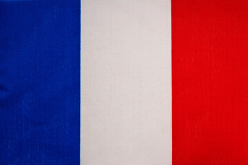 National flag of the state of France close-up. State background.