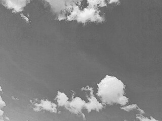 White cumulus clouds in the summer sky pencil drawn sketch background