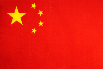 National flag of the state of China close-up. State background.