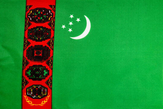 The national flag of the state of Turkmenistan close-up. State background.