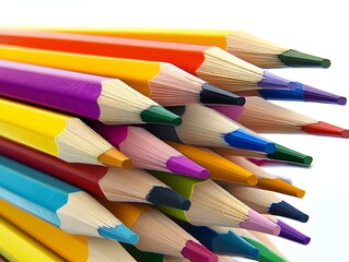 Fototapeta premium Vibrant Stack of Sharpened Colored Pencils in Geometric Arrangement on White Background