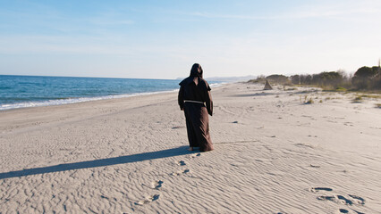Priest Headed To The Sea Water 