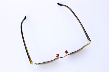 Minimalist Gold-Framed Sunglasses: The front-facing angle provides a clear view of the symmetrical...