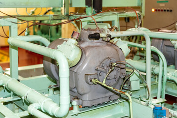 Refrigeration unit with compressors and equipment installed in the ship’s engine room, used for...