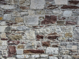 Stone wall patter close view background, natural stones texture