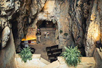 ancient Catholic church located in a natural cave