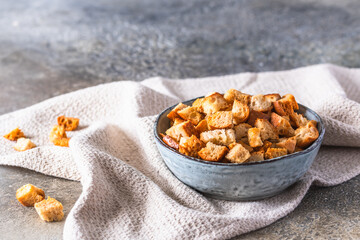 Bowl with homemade crispy croutons for salad or soups
