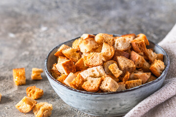 Bowl with homemade crispy croutons for salad or soups