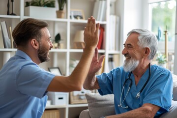 Obraz premium Nurse doctor senior care caregiver help assistence high five retirement home nursing elderly health support teamwork man