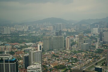 View of Kuala Lumpur cityscape during cloudy weather