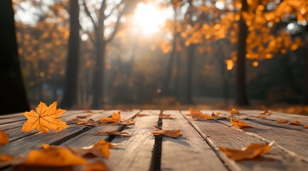 A wooden table covered in autumn leaves. The leaves are scattered all over the table, creating a beautiful and serene atmosphere. The sunlight shining through the trees adds a warm