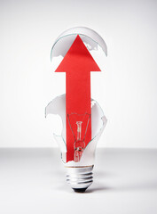 Light bulb and red arrow.
