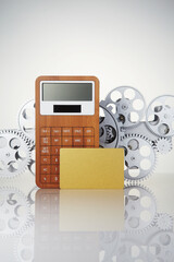 Calculator and card on a white background.
