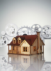 card and model House on a gray background.
