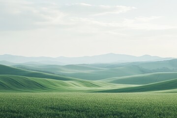 Fototapeta premium Rolling Green Hills and a Misty Mountain Range in the Distance