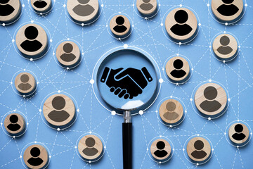Top view design on blue background of Hand shaking inside of magnifier glass which connection with...