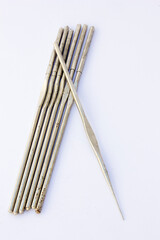 Single-ended nickel-plated steel crochet hooks, ideal for intricate crochet thread lace projects.