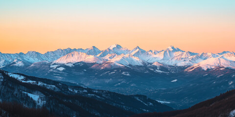 Serene Winter Mountain Range Illuminated by Golden Twilight