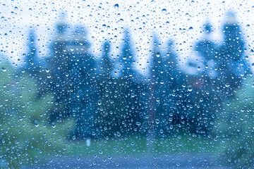 Rain drops on Window during rains showers