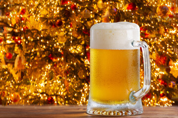 mug of beer on wooden table on festive background