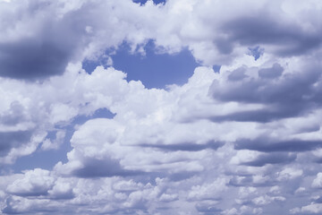 Serene Skyscape: Fluffy Cumulus Clouds Adorning Madrid&rsquo;s Blue Sky
