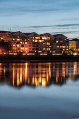 New apartments reflection on River Thames in Londdon