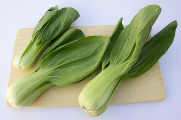 The selenium in bok choy is beneficial for properly functioning thyroid glands. These glands are located at the front base of your neck and play a critical role in metabolism and growth.