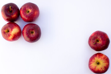 Gala Apple is a variety of (typically) round-shaped apples characterized by their reddish-yellow color and a firm, crisp, yellow-tinged interior. 
