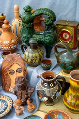 Decanter for drinkand figurines. Ukrainian dishes. Clay ceramics food plate decor painting. Pottery