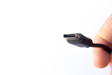 USB Type C Cable Connection: A high-quality image of a USB Type C cable connecting to a device, perfect for use in advertising campaigns, product showcases, and editorial content related to technology