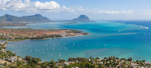 Aerial view: Mauritius island, sailboat and beautiful marina