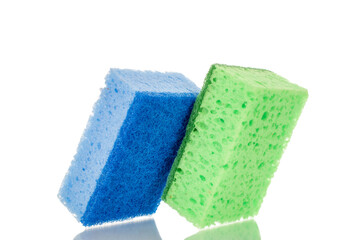 Two kitchen sponges, macro, isolated on white background.