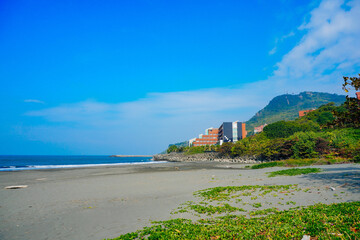 Kaohsiung, Taiwan, Republic of China, 01 25 2024: The landscape of Kaosiung Sizihwan Bay beach in Kaohsiung  © Feng