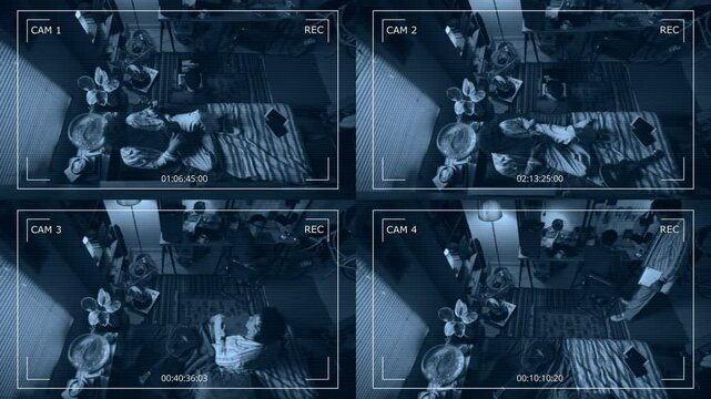 Surveillance camera shot of young male programmer coding on computer and laptop, his friend relaxing with phone and ukulele, opening laptop, noticing camera and standing on bed