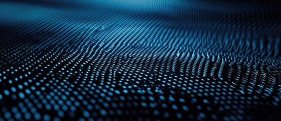 Abstract representation of a textured surface with a blue gradient and dot patterns.