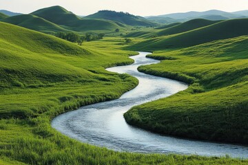 River running through a lush green valley