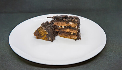 Slice of a Dark Chocolate Truffle Dark Forest Brown Cake for a New Year Celebration
