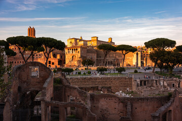 Fototapeta premium Rome city, Italy. Ancient ruins in evening sun