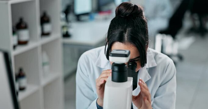 Science, woman and microscope with computer in laboratory for medical research or experiment results. Pathology study, happy professional and analysis of scientific discovery, disease cure or testing