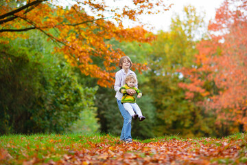 Kids playing in autumn park