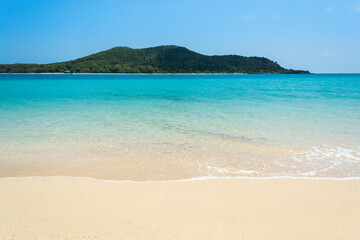 tropical beach with blue sky
