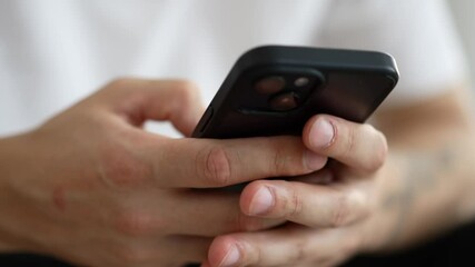 phone in hands, close-up.
Touch phone in hands.
A man with a phone in his hands.