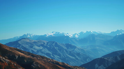 Fototapeta premium A breathtaking view of a mountain range on a clear day.