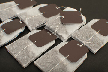 Tea pockets on black background	