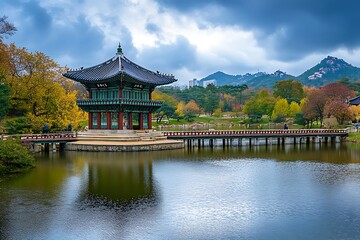 Traditional Korean Pavilion Reflected in Calm Water of Serene Lake