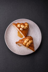 Sweet crispy croissant with salted caramel and glazed popcorn