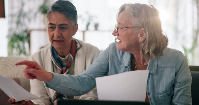 Senior couple, lesbian and paperwork for income in home, reading invoice and asset management. Old people, talk and documents for transaction bills, finance and power of attorney form in retirement