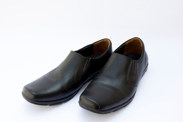 Classic Elegance: Black leather shoes, timeless and sophisticated.